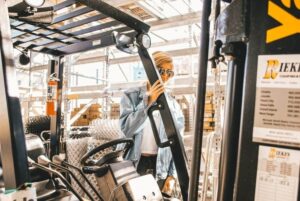 Person getting on a forklift truck